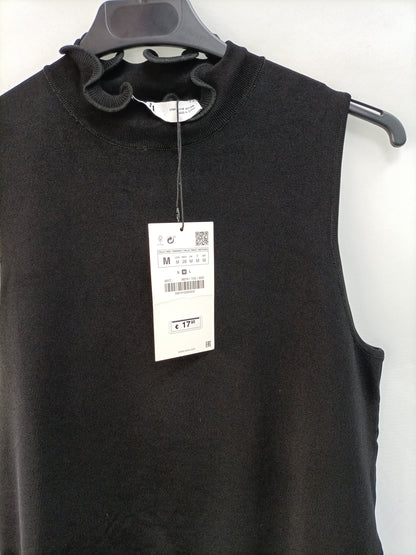 ZARA. Top punto negro T.m