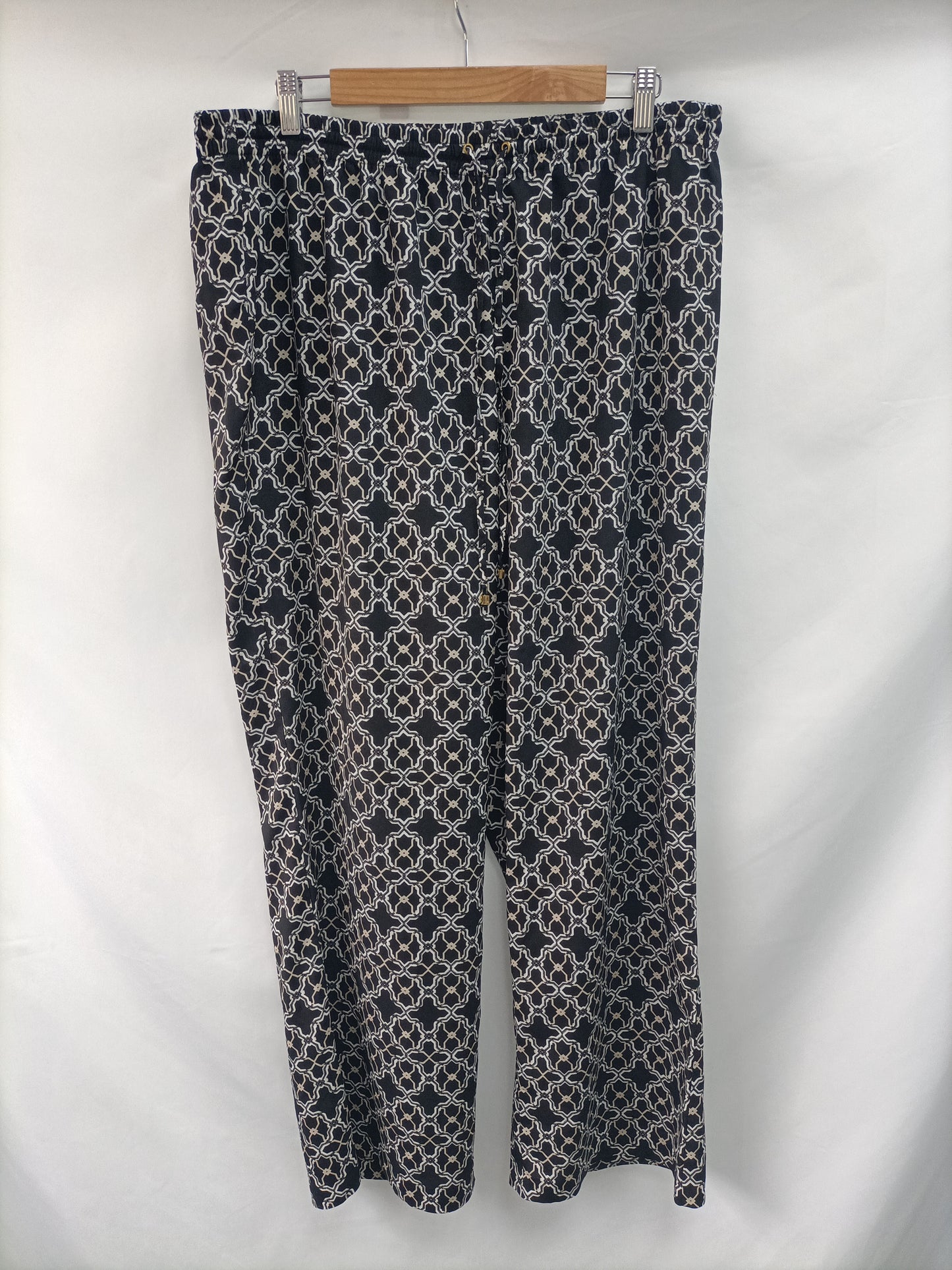 CALVIN KLEIN. Flowy printed trousers. Size 50