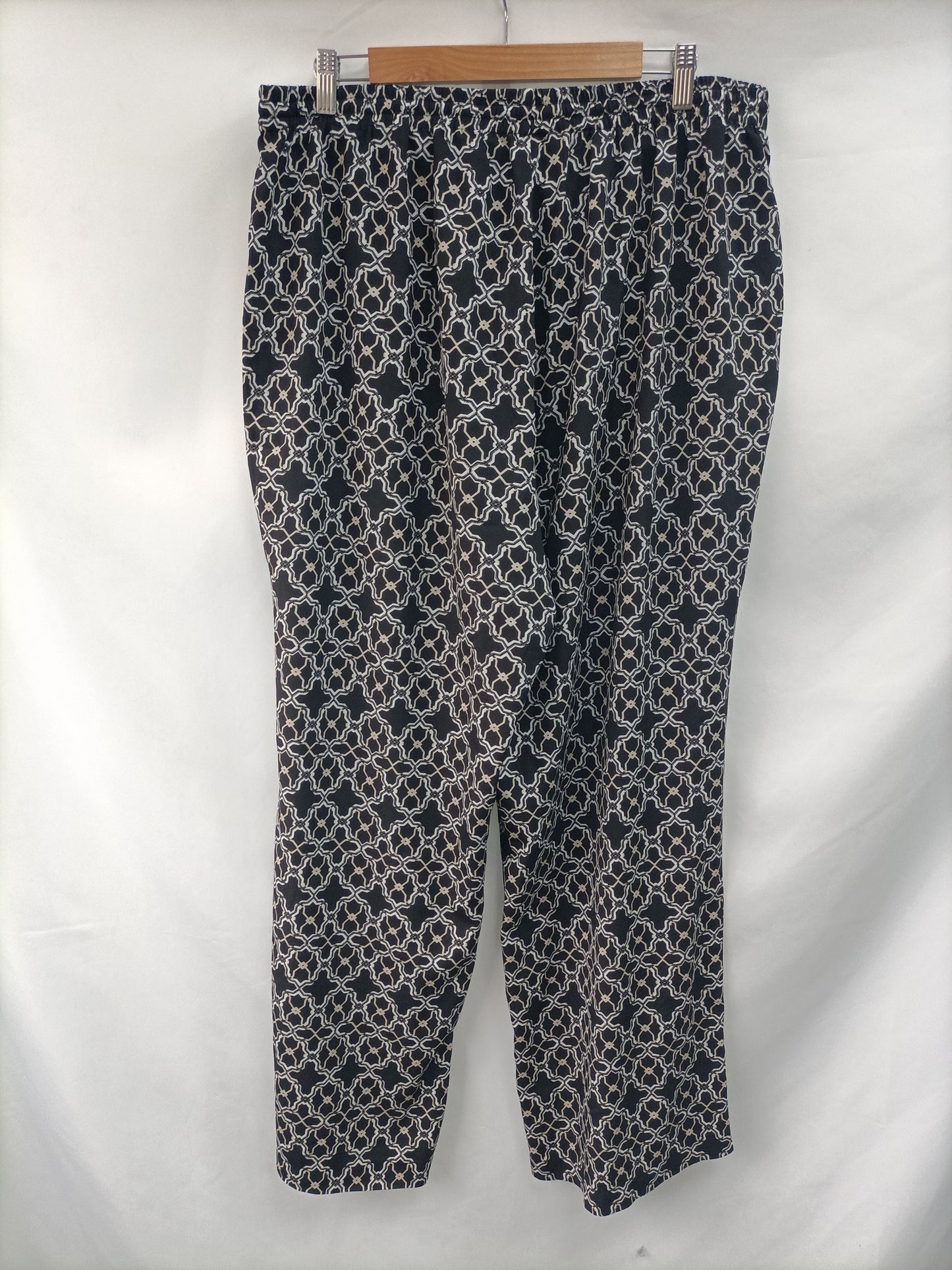 CALVIN KLEIN. Flowy printed trousers. Size 50