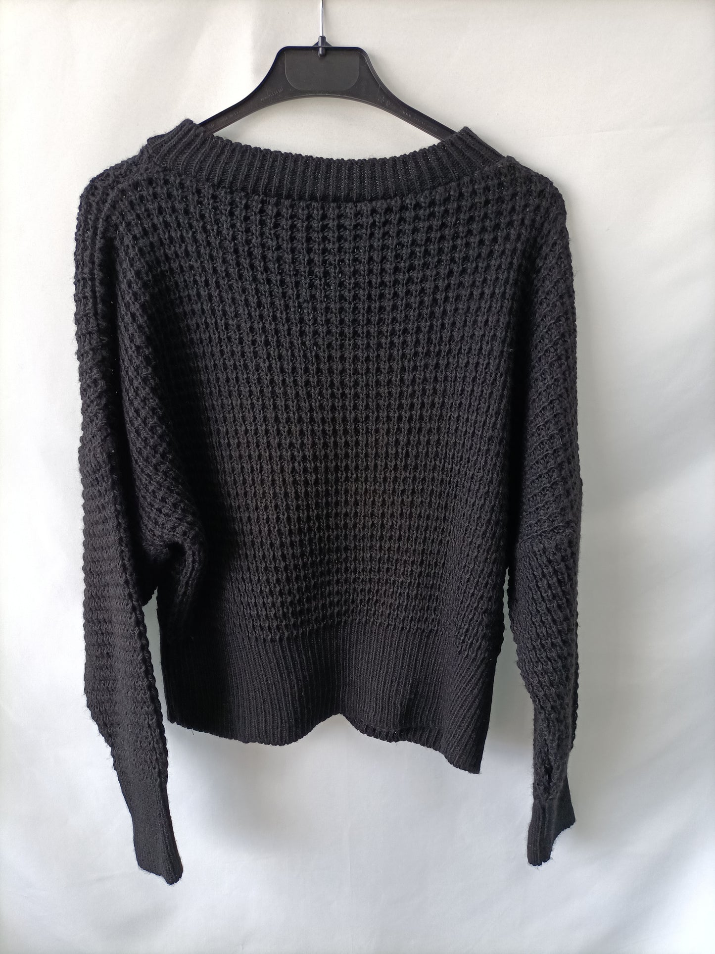 OTRAS. Jersey negro punto Tu(s)