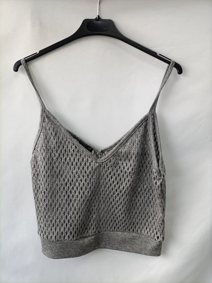 ZARA. Top punto gris T.l