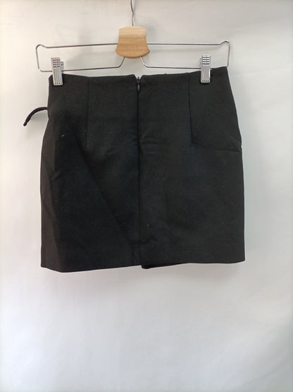 ZARA. Falda negra cruzada cuerda T.xs
