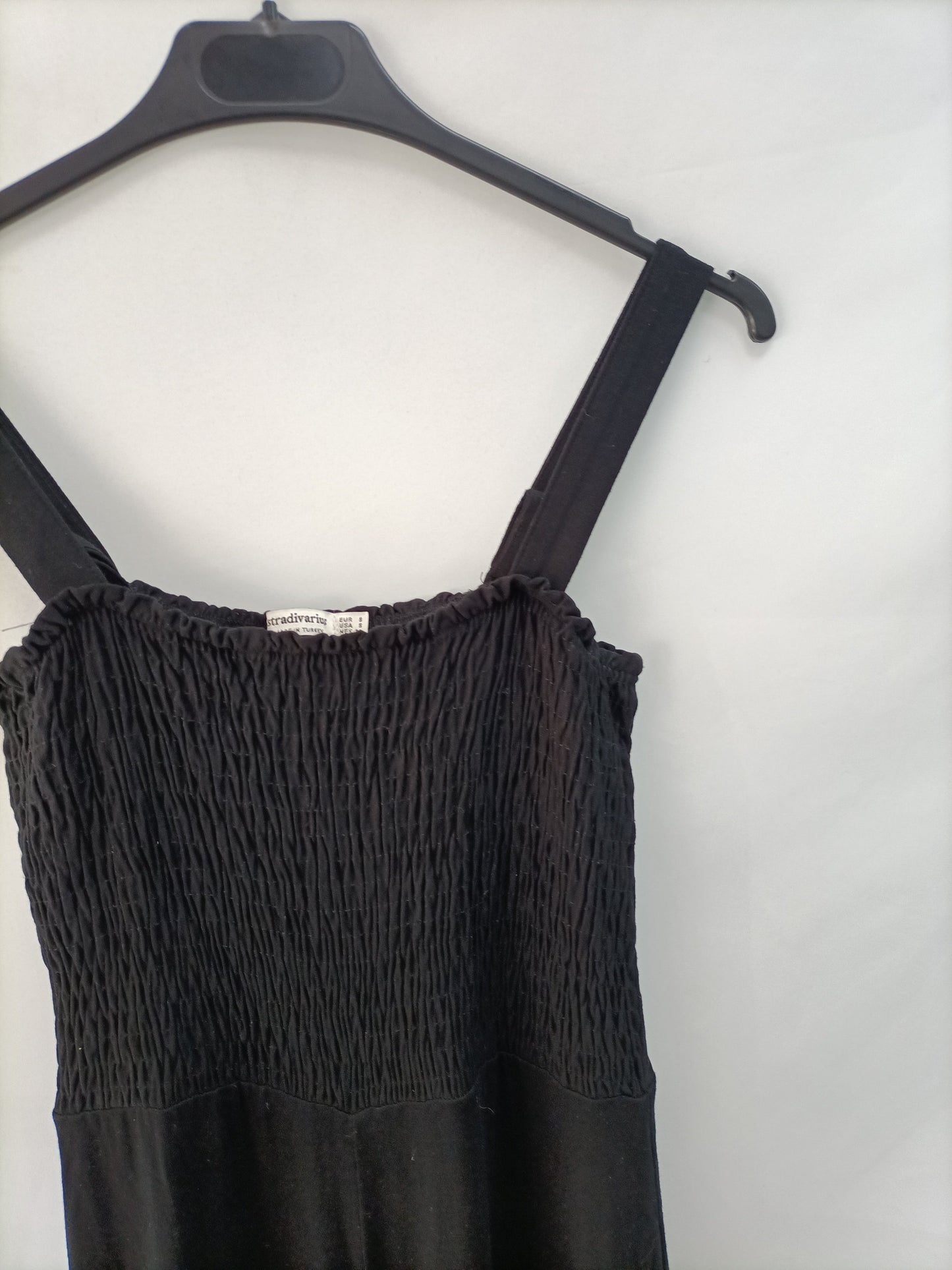 STRADIVARIUS.Mono negro nido de abeja T.s