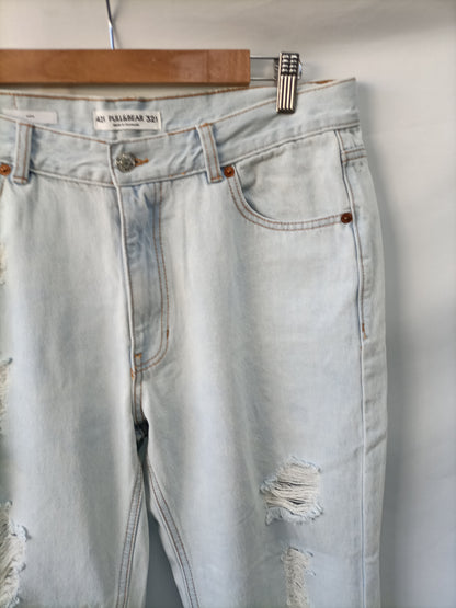 PULL&BEAR. Pantalón denim rotos T.42