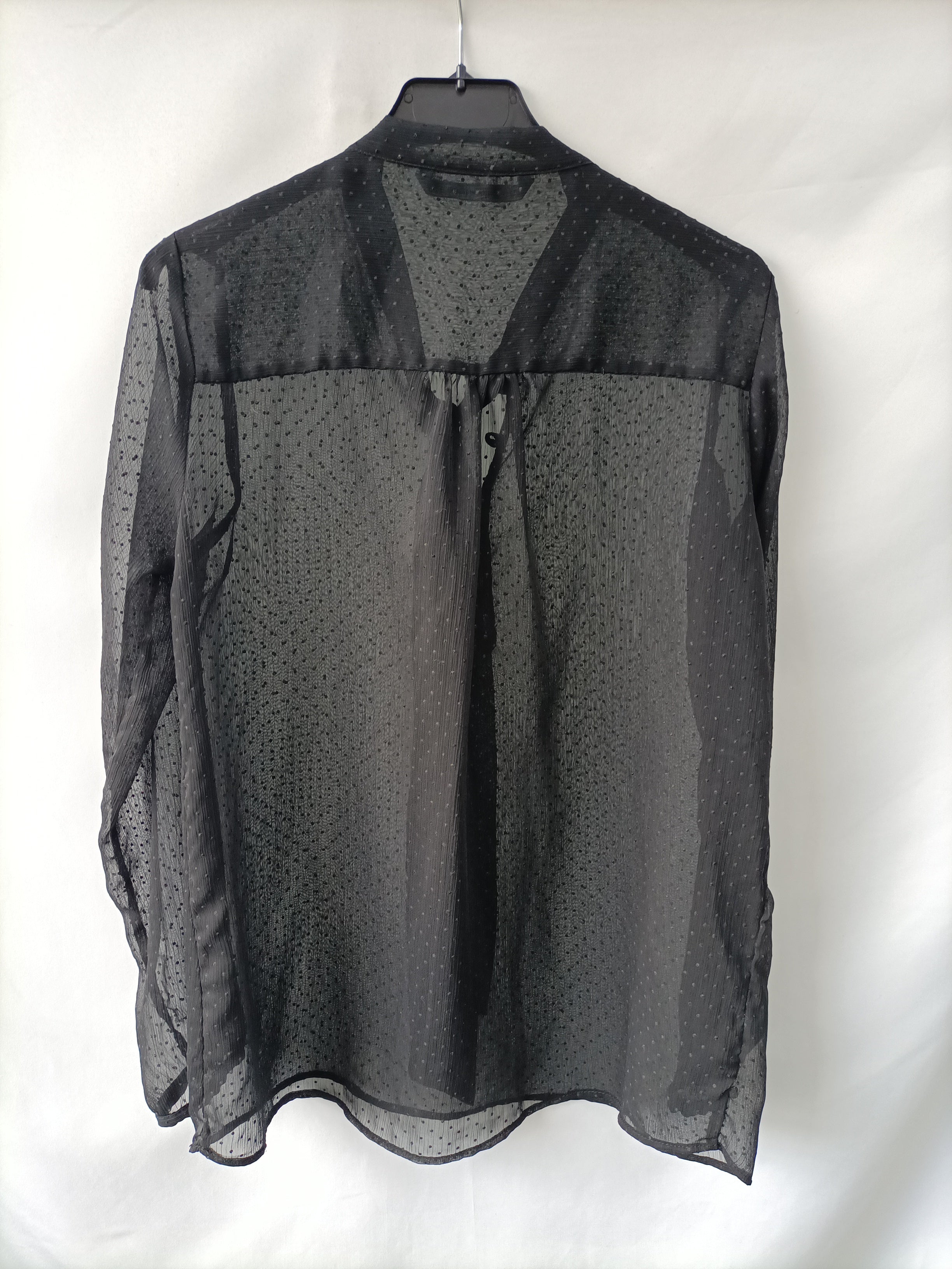 blusa semitransparente plumeti