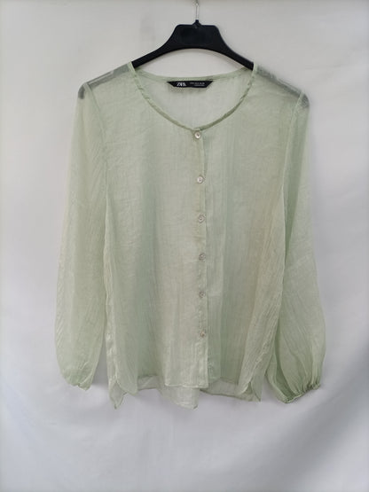 ZARA. Semi-transparent green Ts blouse