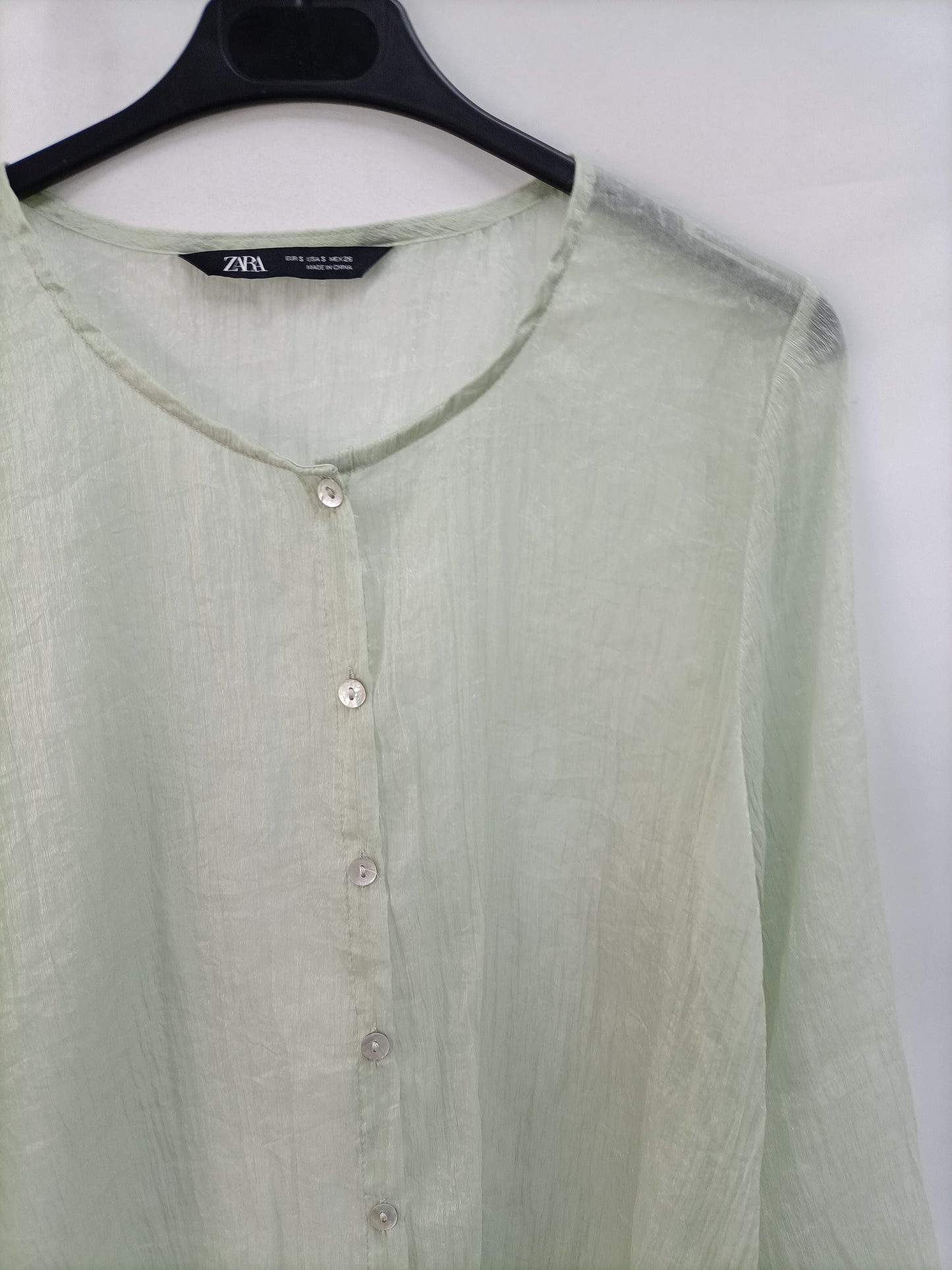 ZARA. Semi-transparent green Ts blouse