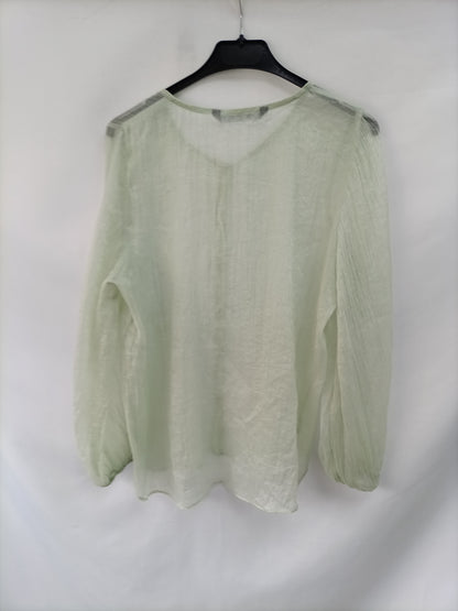 ZARA. Semi-transparent green Ts blouse