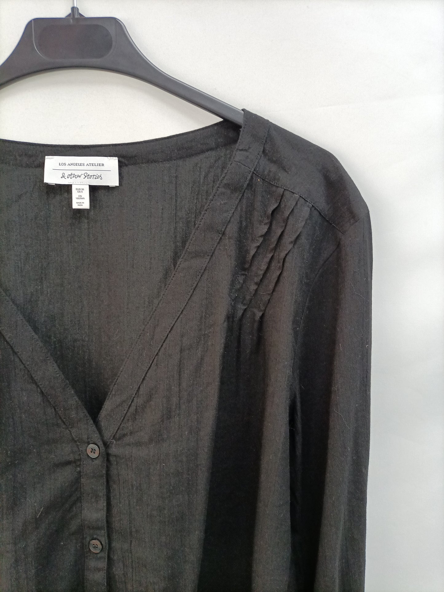 &OTHER STOREIS. Blusa negra algodón T.36