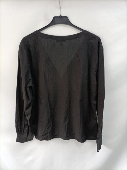&OTHER STOREIS. Blusa negra algodón T.36