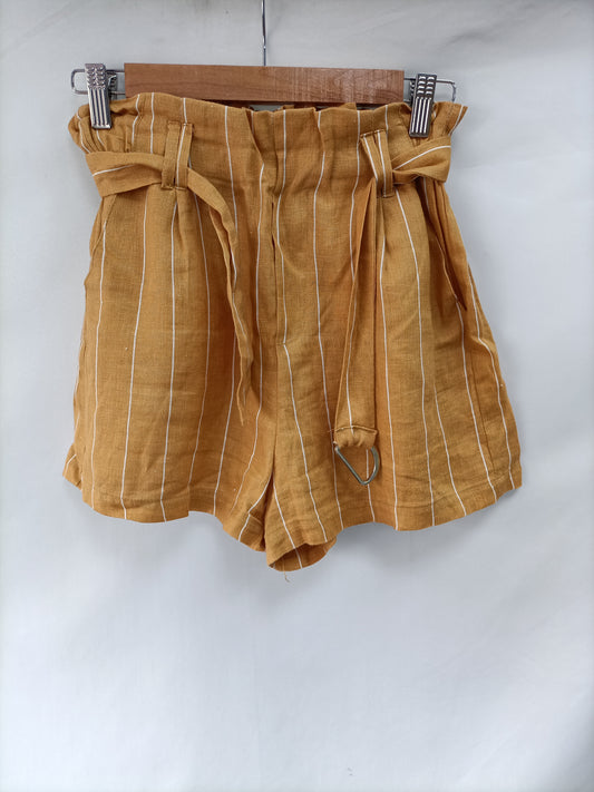 BERSHKA. Pantalón mostaza rayas T.m