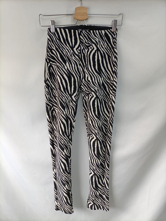 ZARA. Leggins cebra T.s