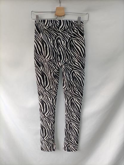 ZARA. Leggins cebra T.s