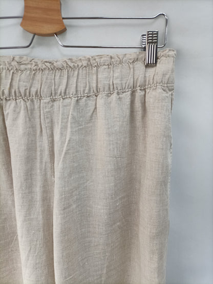 H&amp;M. Beige wide-leg trousers Tm