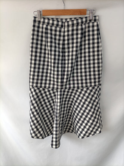 UTERQÜE. Falda cuadros volante T.36