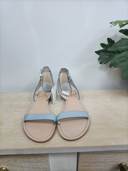 ZARA. Sandalia plana tiras azul celeste T.39
