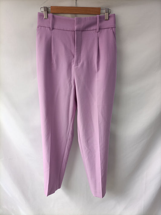 ZARA. Pantalón lila de vestir T.m