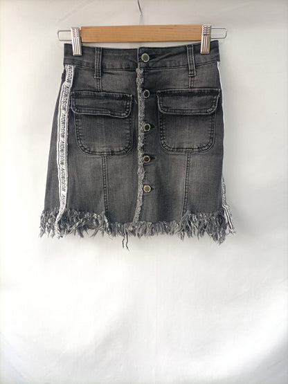 MUSUMDIV .Falda botones T.xs