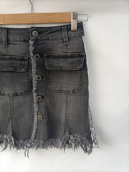 MUSUMDIV .Falda botones T.xs