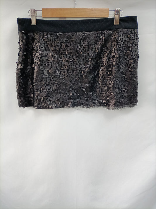 ZARA. mini falda negra lentejuelas T.L