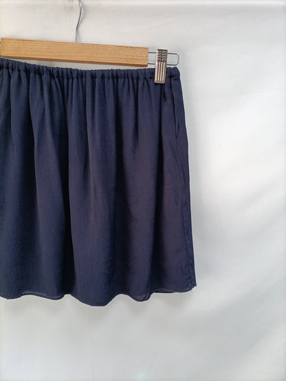 BROWNIE.Falda corta azul marino T.s