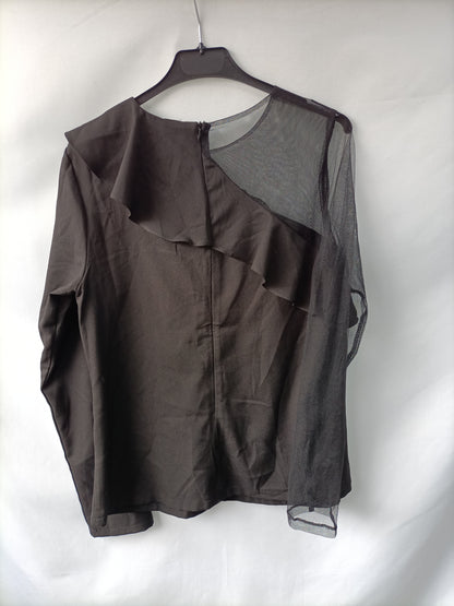 MINUETO. Top negro asimétrico volante T.m