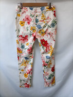 ZARA. pantalon beige estampado flores T.36
