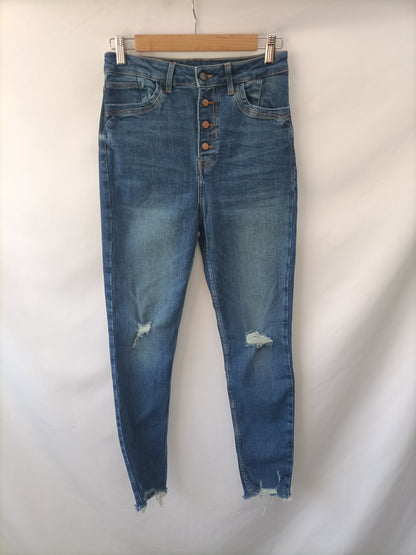 ZARA. Pantalón vaquero botones  T.38