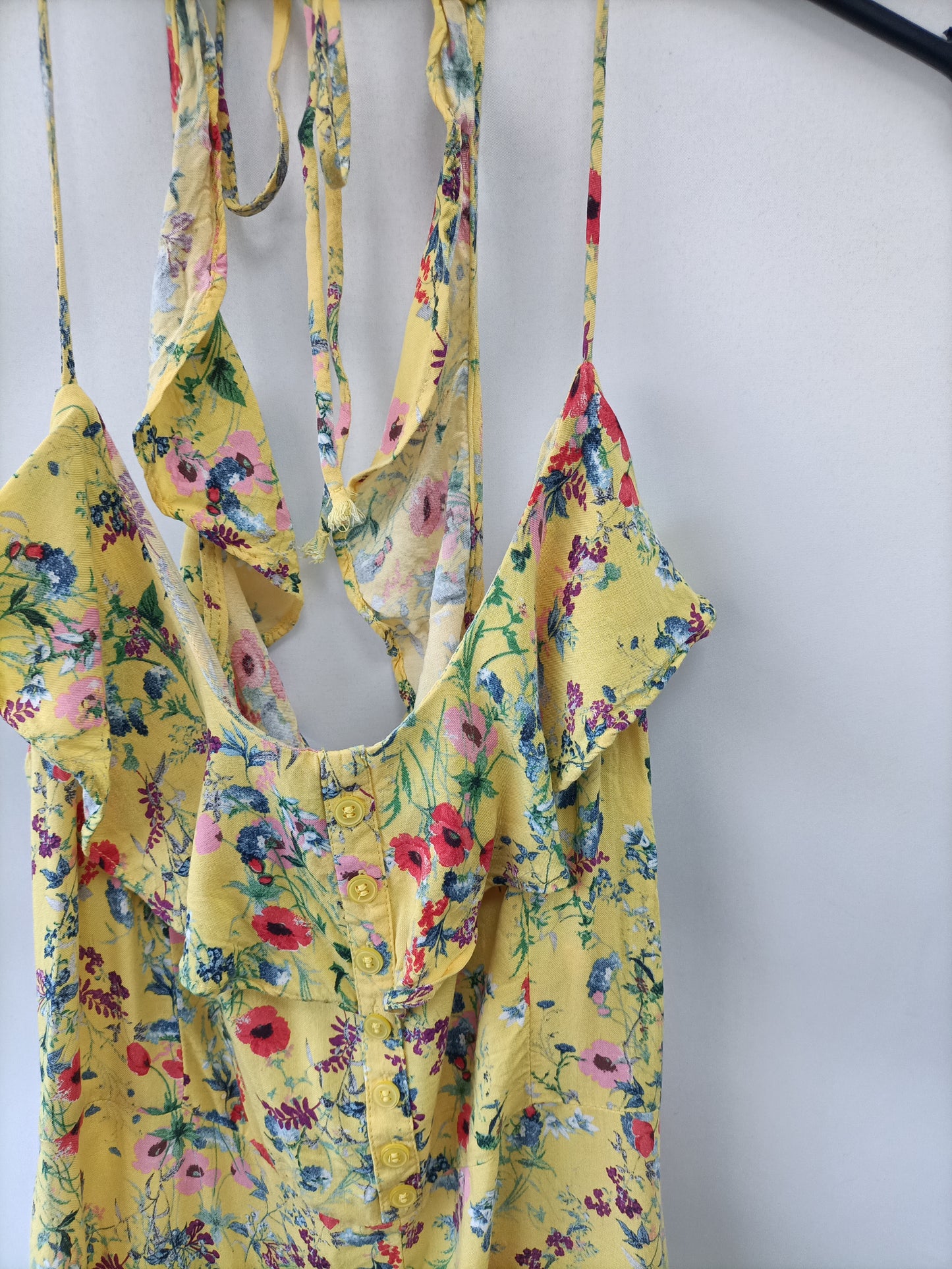 BERSHKA. Mono amarillo flores  T.m