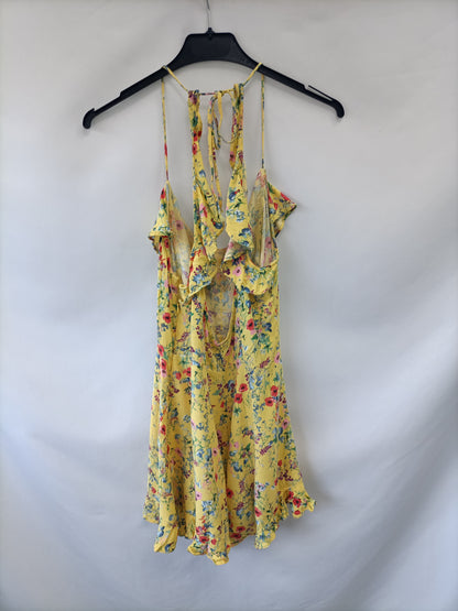 BERSHKA. Mono amarillo flores  T.m