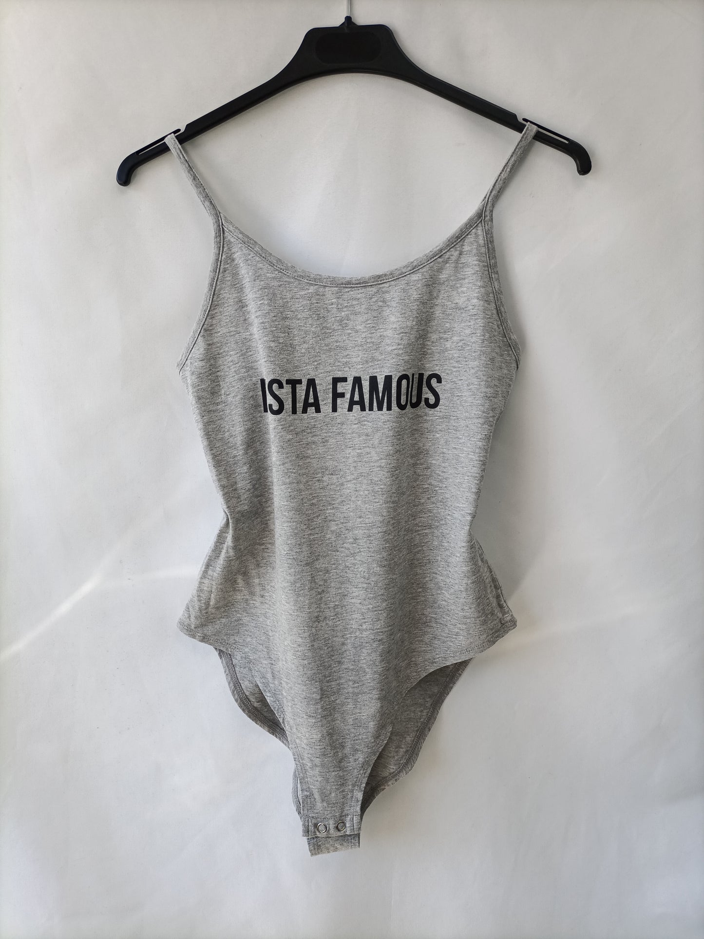 PRIMARK. Body grid letters T.40