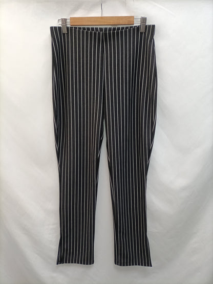 ZARA. Pantalón rayas T.l
