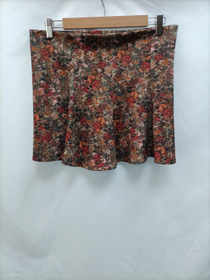 OTRAS. Falda flores marrones T.l