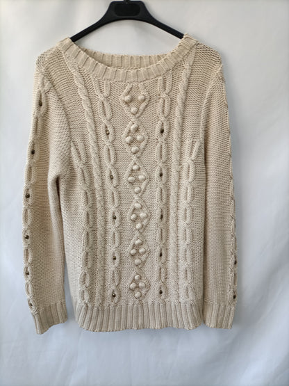 OTRAS.Jersey beige ochos tachuelas T.U (m)