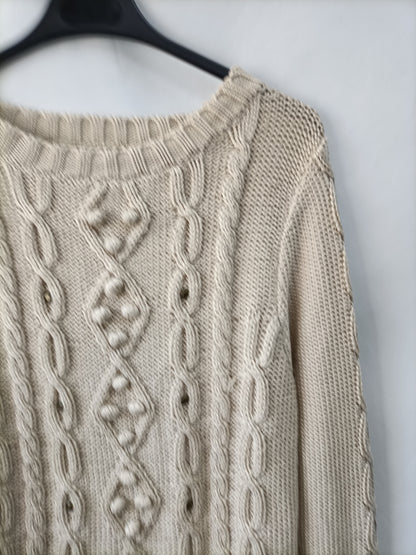 OTRAS.Jersey beige ochos tachuelas T.U (m)