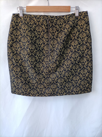 WAREHOUSE. Falda negra vintage T.44