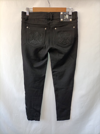 HIGHLY PREPPY.Pantalón negro elástico T.m