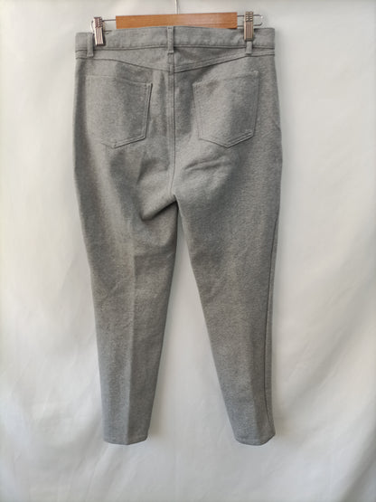 PURIFICACIÓN GARCÍA. Stretch grey trousers, size 40