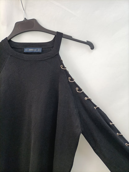 ZARA. Jersey negro argollas T.s