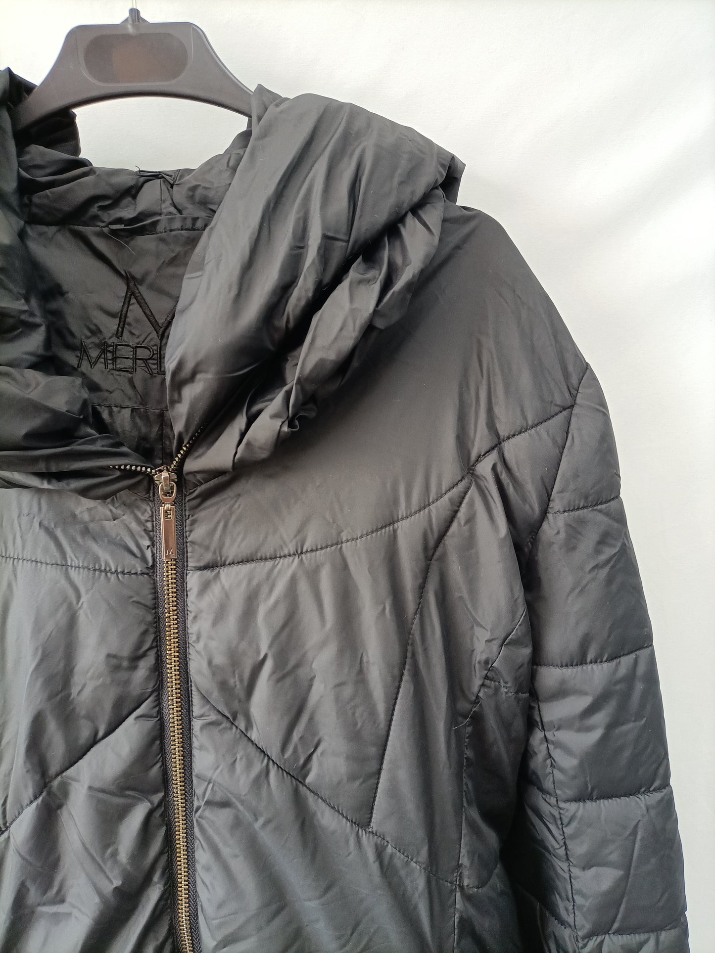 MERLETTI. Black feathers Tu(m)