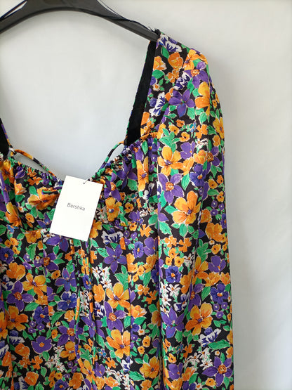 BERSHKA. Vestido corto flores T.m