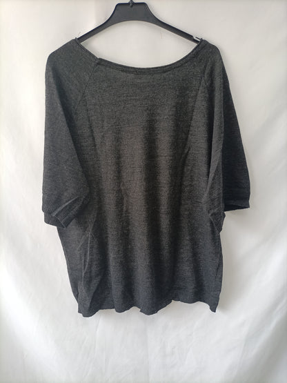 ZARA. Top punto gris T.m