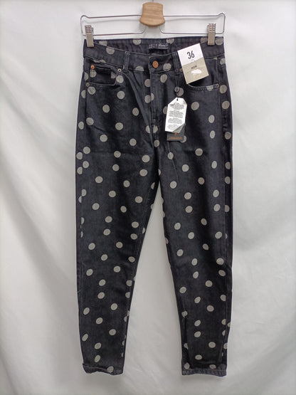 PRIMARK. Pantalón negro lunares T.36