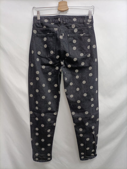 PRIMARK. Pantalón negro lunares T.36