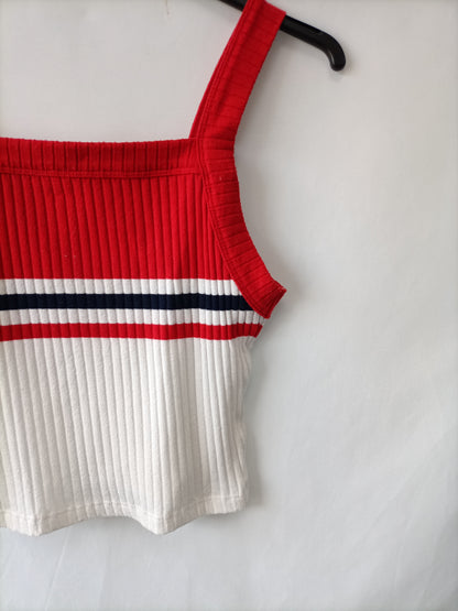 BERSHKA. Top rayas corto T.s