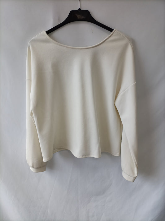 OTRAS. Camiseta beige elástica Tu