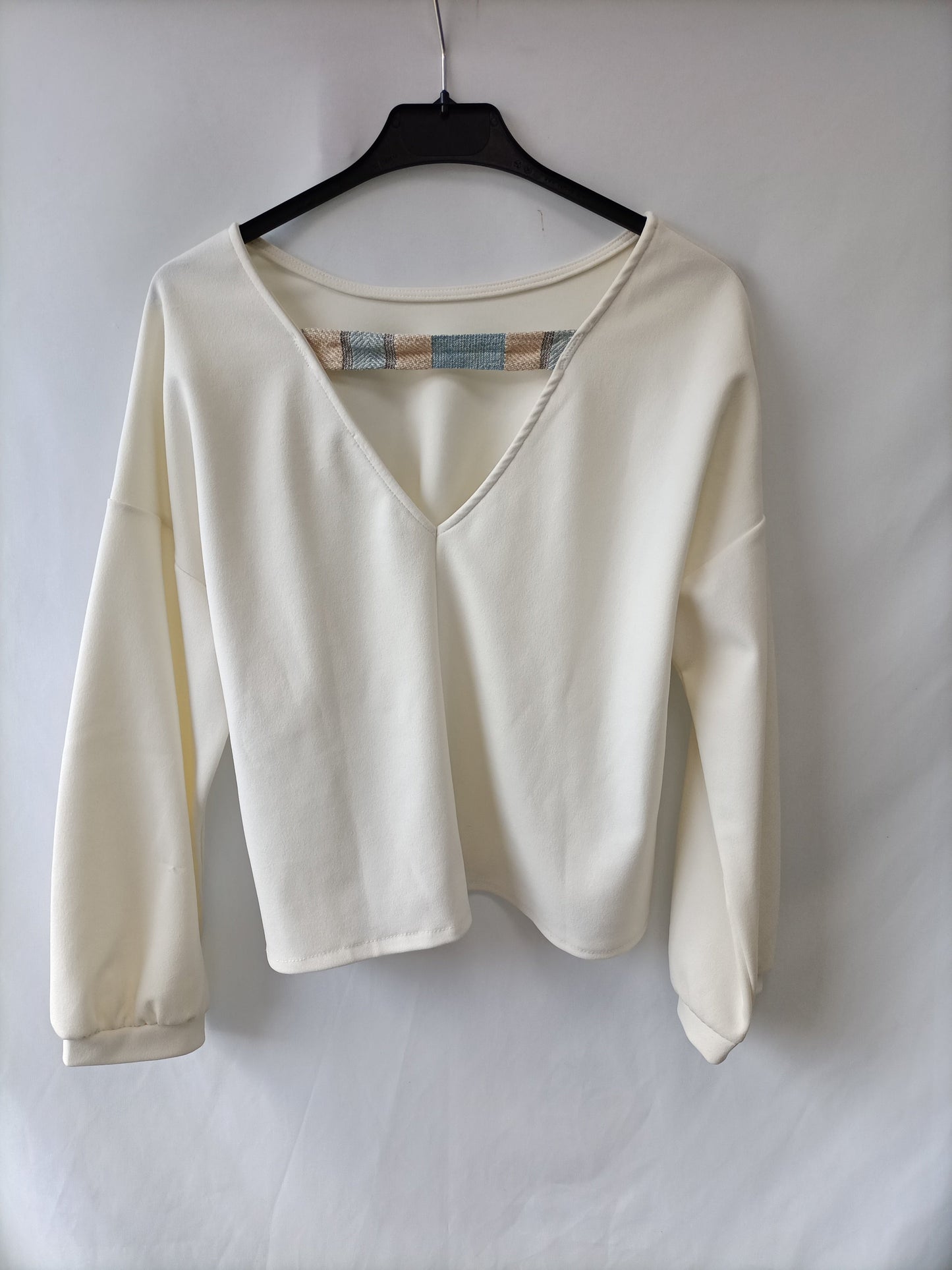 OTRAS. Camiseta beige elástica Tu