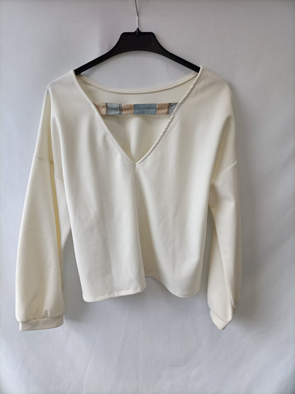 OTRAS. Camiseta beige elástica Tu