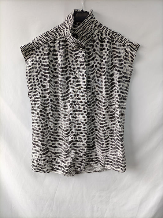 MASSIMO DUTTI. Ts linen printed blouse