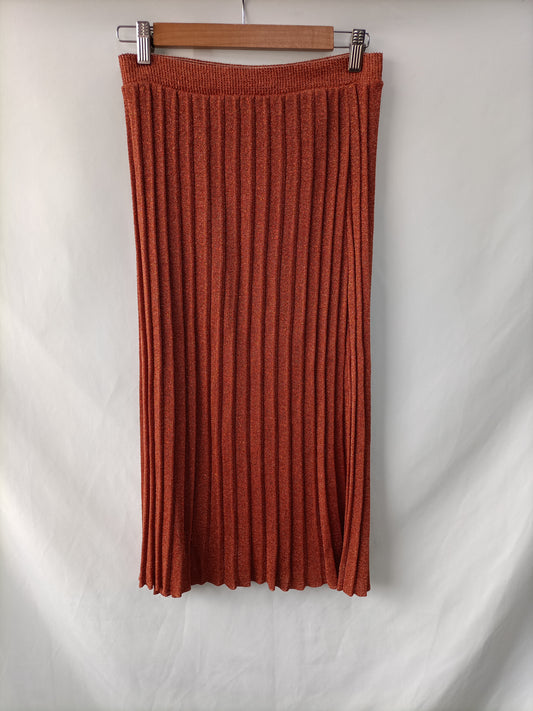 OTRAS. Falda midi punto  hilos Tu(m)